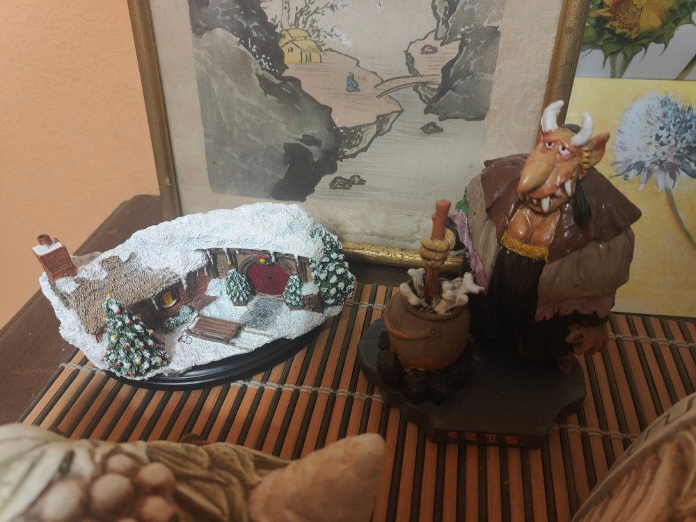 A Christmas hobbit hole figurine.